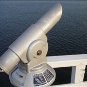 Picture Of Telescope And Dark Blue Water At The Timmendorfer Strand